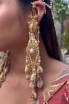 Shop_Vaidaan_Gold Plated Stones Padmana Dangler Earrings_at_Aza_Fashions