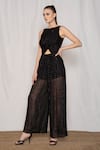Buy_AMRTA by GUNEET KONDAL_Black 98% Viscose Georgette 2% Metallic Yarn Round Front Cut Out Jumpsuit _Online_at_Aza_Fashions