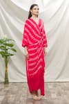 Nupur Kanoi_Coral Crepe Print Stripes V Neck Wrap Dress  _Online_at_Aza_Fashions