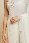 Shop Izzumi Mehta Ivory Georgette Cutwork, Mirror Round Hand Embroidered Saree With Blouse Online at Aza Fashions Shop_Izzumi Mehta_Ivory Georgette Cutwork, Mirror Round Hand Embroidered Saree With Blouse _Online_at_Aza_Fashions