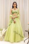 Buy_Silky Bindra_Green Organza, Shantoon Sweetheart Neck Floral Embroidered Lehenga Set _at_Aza_Fashions