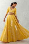 Buy_Devnaagri_Yellow Raw And Organza Embroidery Thread Blunt V Floral Lehenga Set _Online_at_Aza_Fashions