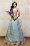 Buy_Izzumi Mehta_Blue Blouse Net Lehenga Organza Sweetheart Neck Embroidered Bridal Set _at_Aza_Fashions
