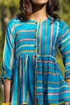 Rang Swati Vijaivargie_Blue Cotton Satin Round Striped Peplum Shirt _at_Aza_Fashions