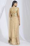 Shop_Manish Malhotra_Beige Net Embellished Saree_at_Aza_Fashions