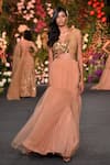 Buy_Kashmiraa_Peach Swiss Net Embroidery Zardozi Mermaid Style Lehenga With Draped Bustier _at_Aza_Fashions