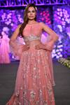 Shop_Kashmiraa_Peach Organza Aari Boat Neck Embroidered Bridal Lehenga Set _at_Aza_Fashions