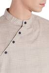 Shop Son Of A Noble Snob Beige Linen Diagonal Button Front Short Kurta Online at Aza Fashions Shop_Son Of A Noble Snob_Beige Linen Diagonal Button Front Short Kurta_Online_at_Aza_Fashions