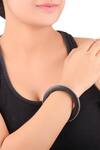 Shop_Sangeeta Boochra_Black Metal Circular Motif Bangle_at_Aza_Fashions