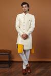 Buy_Seven_White Silk Jaquard Asymmetric Sherwani Set_Online_at_Aza_Fashions