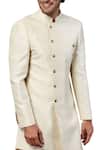 Shop_Seven_White Silk Jaquard Asymmetric Sherwani Set_Online_at_Aza_Fashions