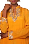 Nikasha Yellow Crepe Stand Collar Asymmetric Tunic And Dhoti Pant Set at Aza Fashions Nikasha_Yellow Crepe Stand Collar Asymmetric Tunic And Dhoti Pant Set _at_Aza_Fashions