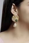 Buy_Khushi Jewels_Gold Plated Stone Carved Danglers_at_Aza_Fashions