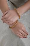 Shop_Zevar By Geeta_Gold Plated Crystals Bangles Set Of 2_at_Aza_Fashions