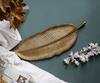 Buy_Sammsara_Gold Aluminium Banana Leaf Platter_at_Aza_Fashions