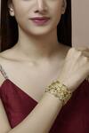 Buy_Mira By Radhika Jain_Gold Plated Metal Carved Handcuff_at_Aza_Fashions