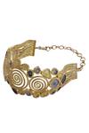 Shop_Mira By Radhika Jain_Gold Plated Metal Carved Bracelet_at_Aza_Fashions
