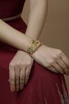 Buy_Mira By Radhika Jain_Gold Plated Metal Carved Bracelet_Online_at_Aza_Fashions