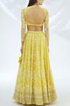 Astha Narang_Yellow Net, Crepe Leaf Neck Embroidered Lehenga Set _Online_at_Aza_Fashions
