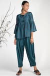 Buy_Umbar_Blue Silk Cotton Blend Pleated Pants  _at_Aza_Fashions