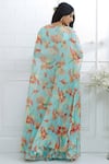 Shop_Mandira Wirk - Indian_Blue Chiffon Leaf Neck Printed Cape Sharara Set _at_Aza_Fashions