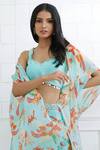 Shop_Mandira Wirk - Indian_Blue Chiffon Leaf Neck Printed Cape Sharara Set _Online_at_Aza_Fashions