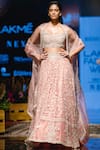 Buy_Ridhi Mehra_Peach Net Embroidered Bridal Lehenga Set _at_Aza_Fashions