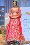 Ridhi Mehra_Red Raw Silk V-shaped Neckline Embroidered Bridal Lehenga Set _Online_at_Aza_Fashions