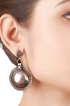 Shop_Sangeeta Boochra_Silver Plated Metal Carved Dangler Earrings_at_Aza_Fashions
