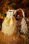 Shop_The Right Sided_Yellow Pearl, Stone Embellished Potli Bag_at_Aza_Fashions