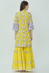 Shop Kunwarani Ritu Yellow Mulmul Notched Embellished Kurta Sharara Set at Aza Fashions Shop_Kunwarani Ritu_Yellow Mulmul Notched Embellished Kurta Sharara Set _at_Aza_Fashions