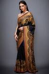 RI.Ritu Kumar_Black Satin Embroidered Saree_at_Aza_Fashions