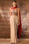 Qbik_Beige Shimmer Lycra Leaf Neck Draped Skirt Set  _Online_at_Aza_Fashions