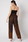 Shop_Saaksha & Kinni_Brown Satin Printed Trousers_at_Aza_Fashions