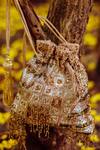 Buy_Ara Studio_Gold Cutdana Embellished Potli Bag_at_Aza_Fashions