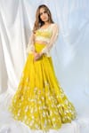 Buy_Maiti Shahani_Yellow Organza Embroidered Leather Work Overlay Crop Top Lehenga Set  _at_Aza_Fashions