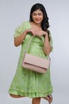 Buy_The House of Ganges_Peach Sandra Vegan Leather Handbag _at_Aza_Fashions