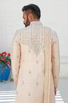 Shop_Vanshik_Peach Raw Silk Embroidered Sherwani And Kurta Set _at_Aza_Fashions
