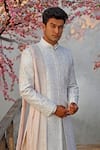 Vanshik_White Raw Silk Embroidered Sherwani And Kurta Set _Online_at_Aza_Fashions