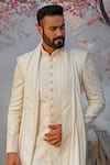 Vanshik_White Raw Silk Embroidered Sherwani Set _Online_at_Aza_Fashions