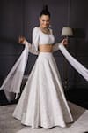 Buy_Mani Bhatia_White Raw Silk Square Neck Sequin Embellished Bridal Lehenga Set _at_Aza_Fashions