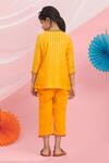 Shop_Nikasha_Orange Cotton Tassels, Embroidery Kurta And Pant Set _at_Aza_Fashions