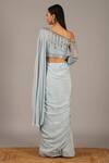 Shop_Nidhika Shekhar_Blue Silk Crepe Asymmetric Pre-draped Saree With One Shoulder Blouse  _at_Aza_Fashions