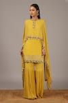 Buy_Nidhika Shekhar_Yellow Crepe Georgette Round Embroidered Kurta And Sharara Set _at_Aza_Fashions