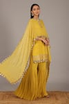 Nidhika Shekhar_Yellow Crepe Georgette Round Embroidered Kurta And Sharara Set _Online_at_Aza_Fashions