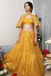 Buy_Asha Gautam_Yellow Banarasi Organza Cape And Lehenga Set_at_Aza_Fashions