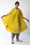 Buy Urvashi Kaur Yellow Cotton Round Neck Check Micro Pleated Dress Online at Aza Fashions Buy_Urvashi Kaur_Yellow Cotton Round Neck Check Micro Pleated Dress _Online_at_Aza_Fashions