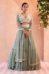 Buy_Ridhi Mehra_Green Blouse  Lehenga Chiffon Dupatta Belevia Tiered Bridal Set _at_Aza_Fashions