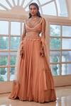 Buy Label Sanya Gulati Peach V Neck Embroidered Blouse And Lehenga Set at Aza Fashions Buy_Label Sanya Gulati_Peach V Neck Embroidered Blouse And Lehenga Set _at_Aza_Fashions