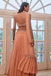Shop Label Sanya Gulati Peach V Neck Embroidered Blouse And Lehenga Set at Aza Fashions Shop_Label Sanya Gulati_Peach V Neck Embroidered Blouse And Lehenga Set _at_Aza_Fashions